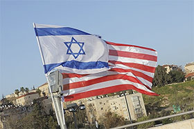 Israeli flag in front of US flag